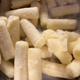 Frozen mashed potatoes in columns in a pan